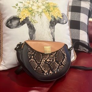 Black brown and animal print cross body purse